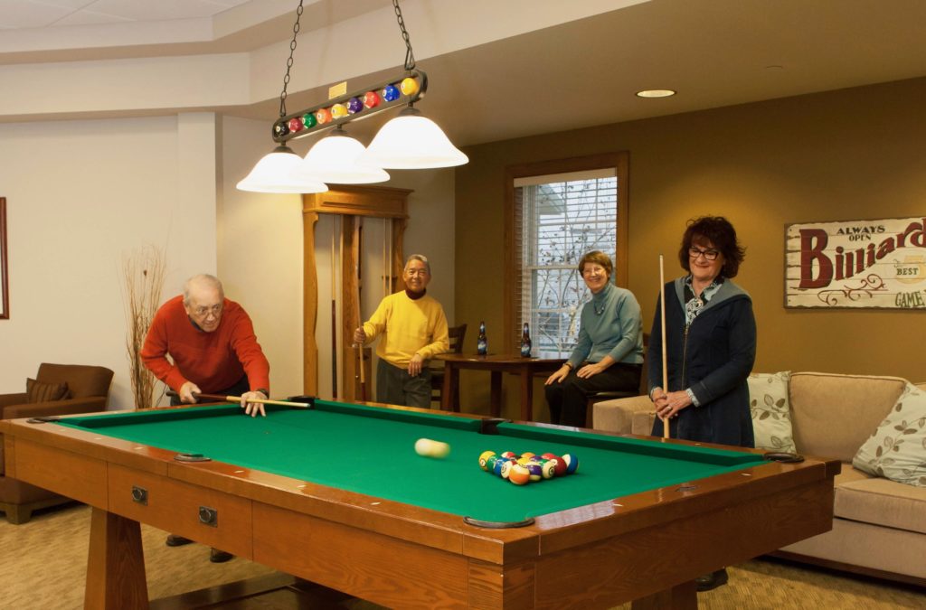 fox run residents playing billiards